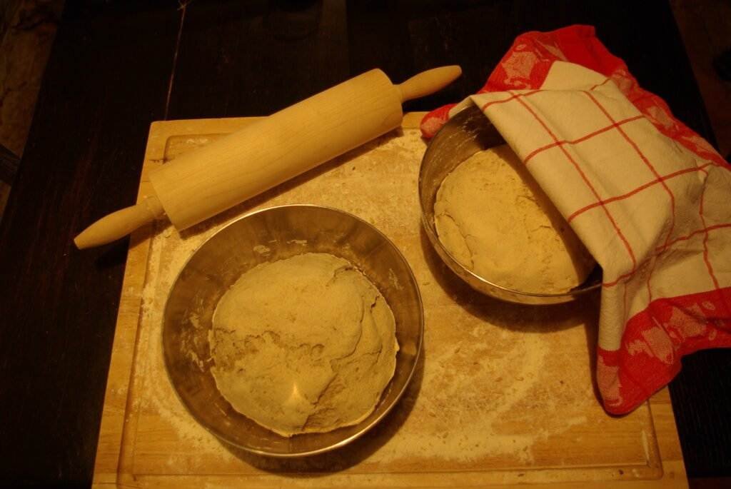 Making pizza in the woodfire oven