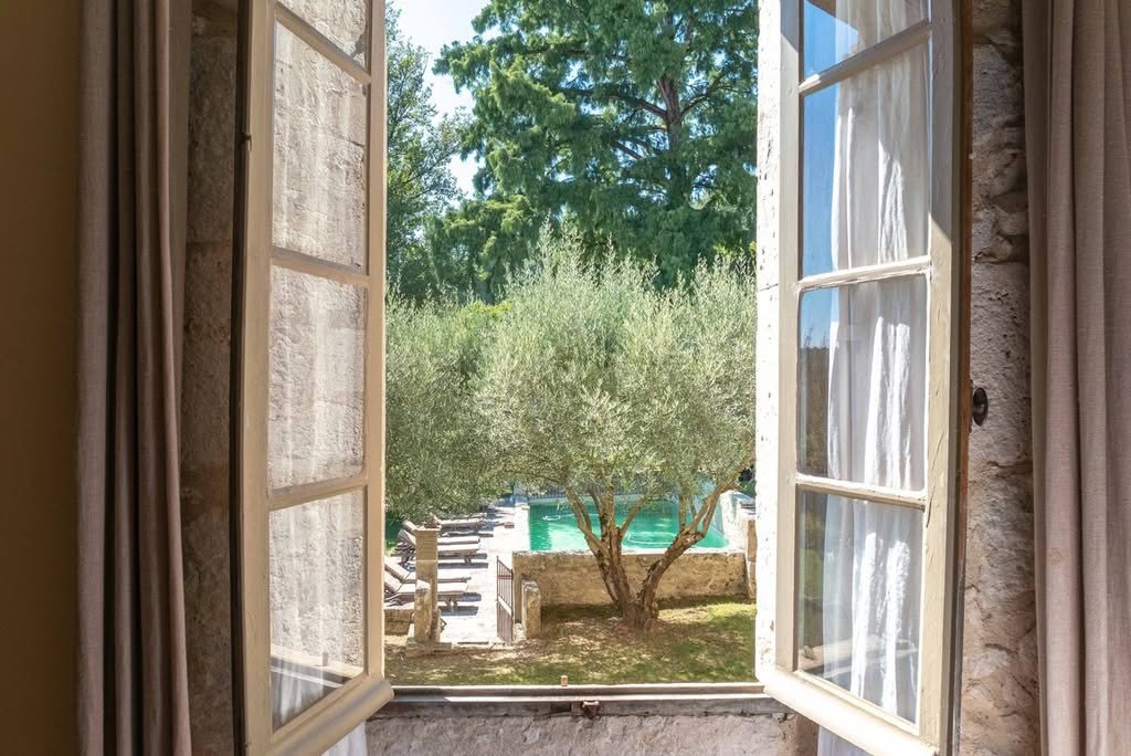 A window onto the garden and the olive trees
