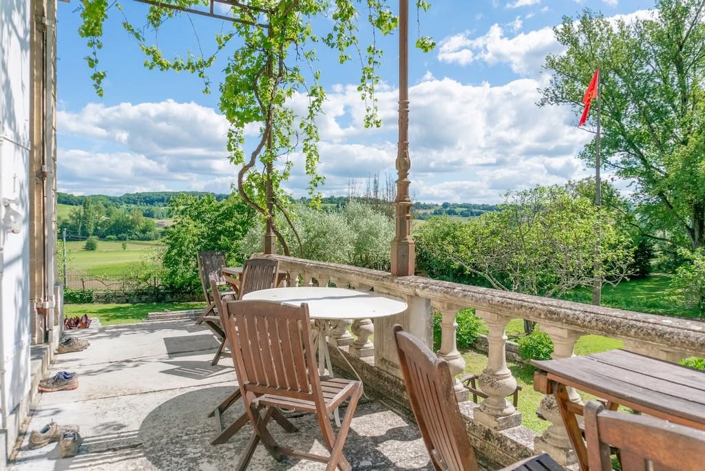 The terrace with its stone balustrade and views over the valley